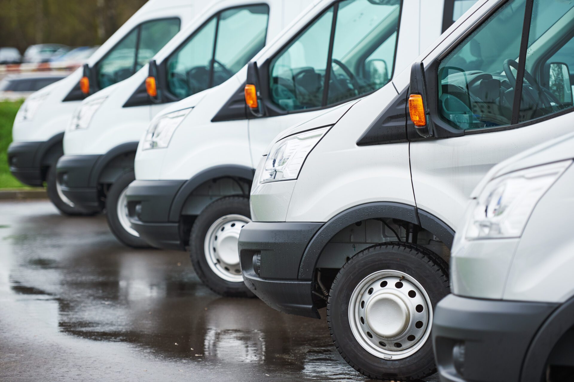 freight services. commercial delivery vans in row at transporting carrier shipping service company parking